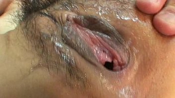 Asian slut gets gaped and fucked by big dildo